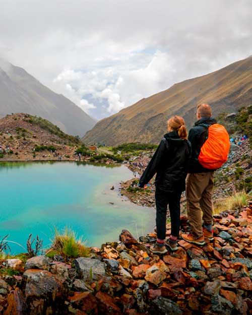Tourist couple at Humantay Lake