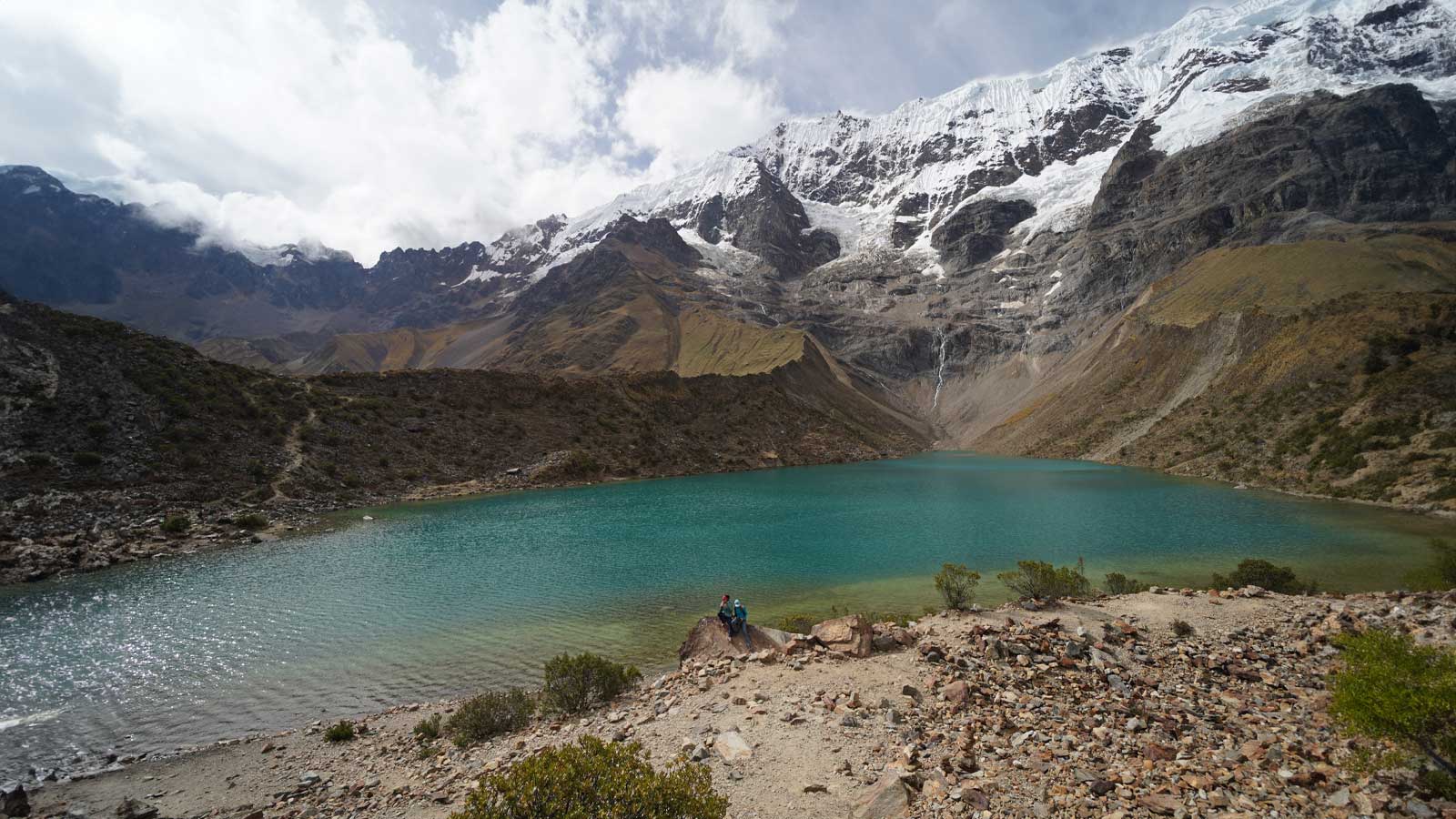 Couple enjoying nature at Humantay lake